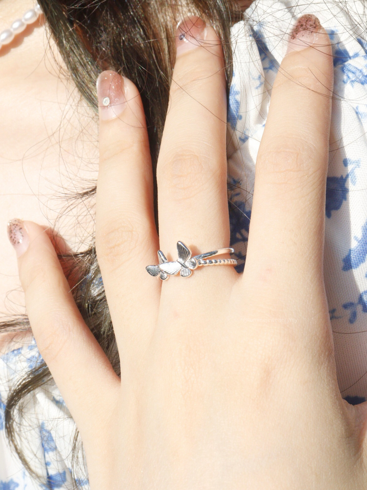 Double Butterfly Rings
