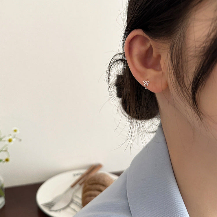Delicate Silver Bow Hoops