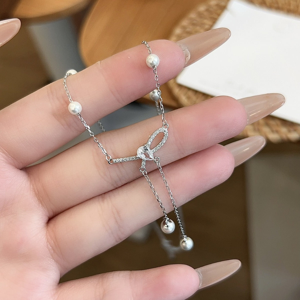 Diamond Bowknot Pearl Tassel Necklace