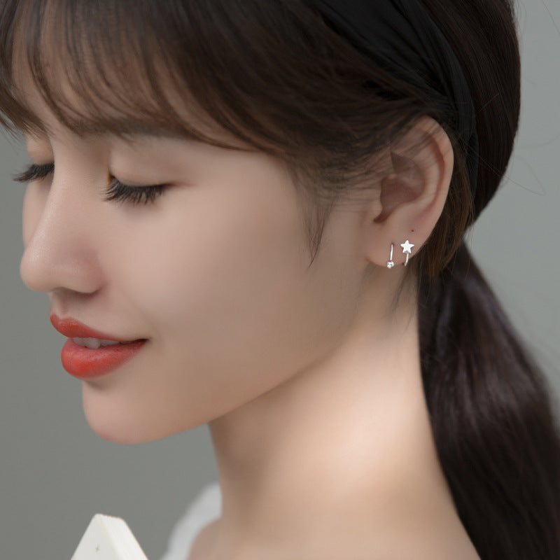 Elegant Spiral Star Studs