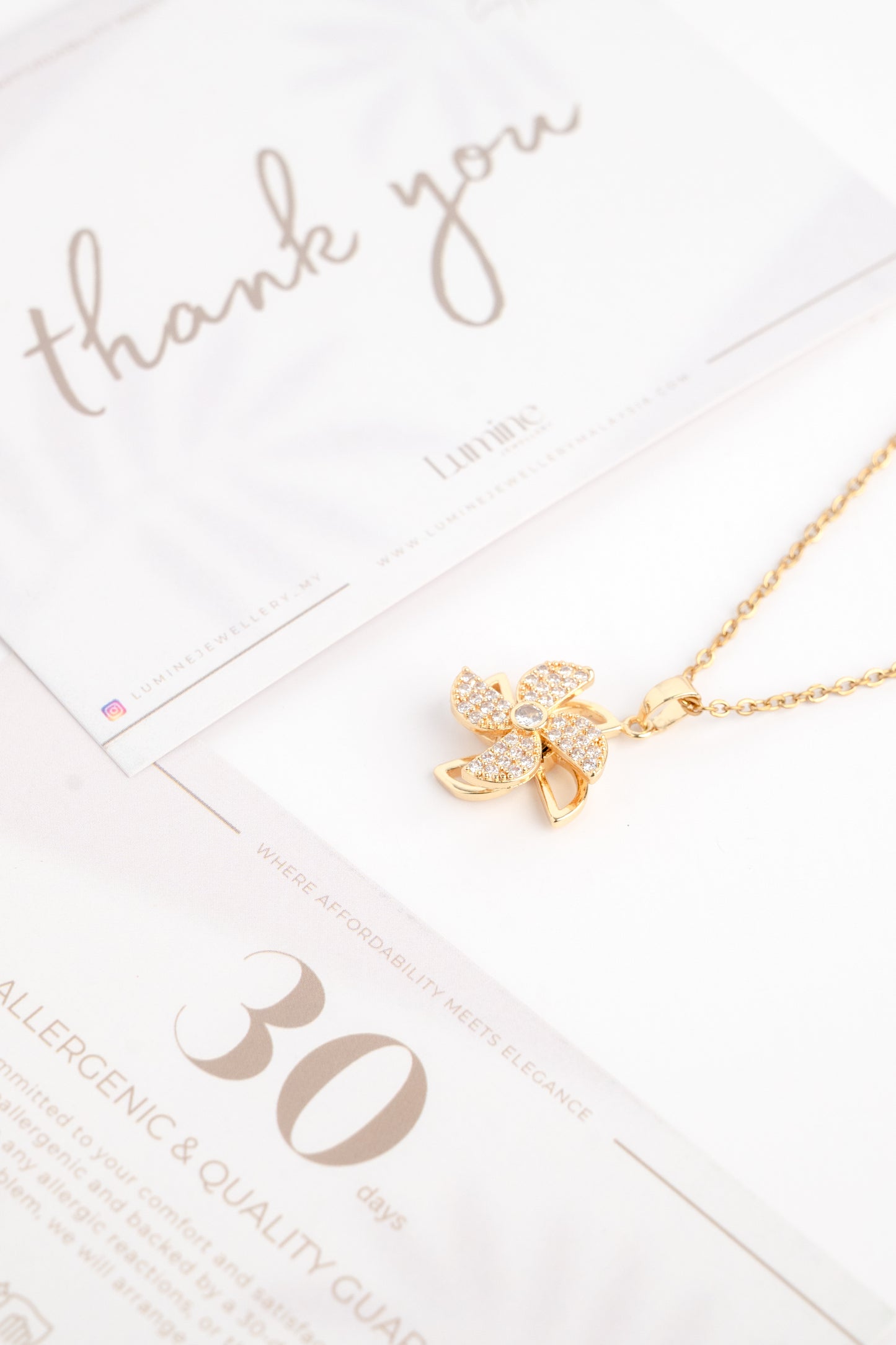 Golden Windmill Diamond Necklace