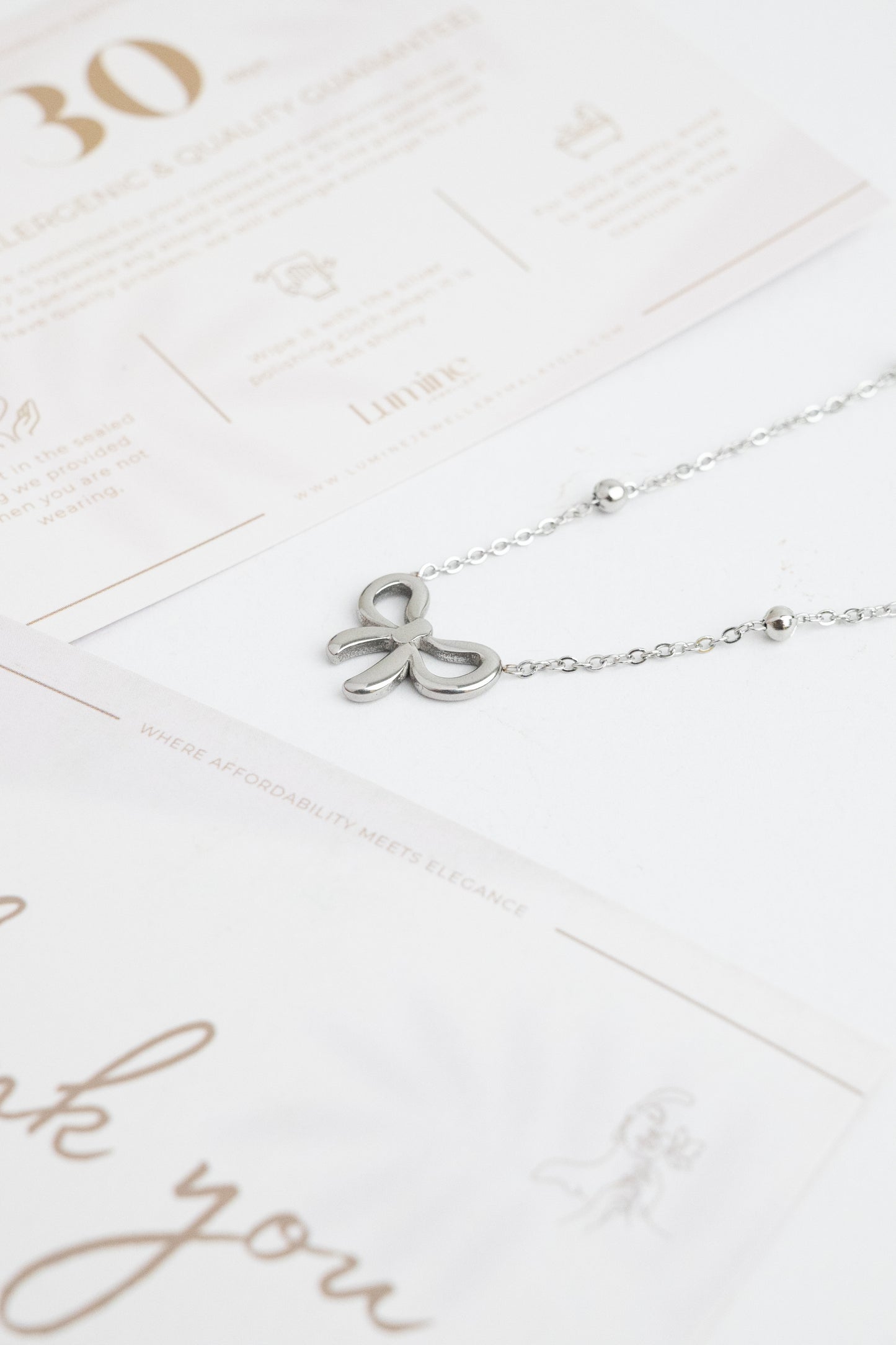 Silver_Dainty_Bow_Elegance_Necklace