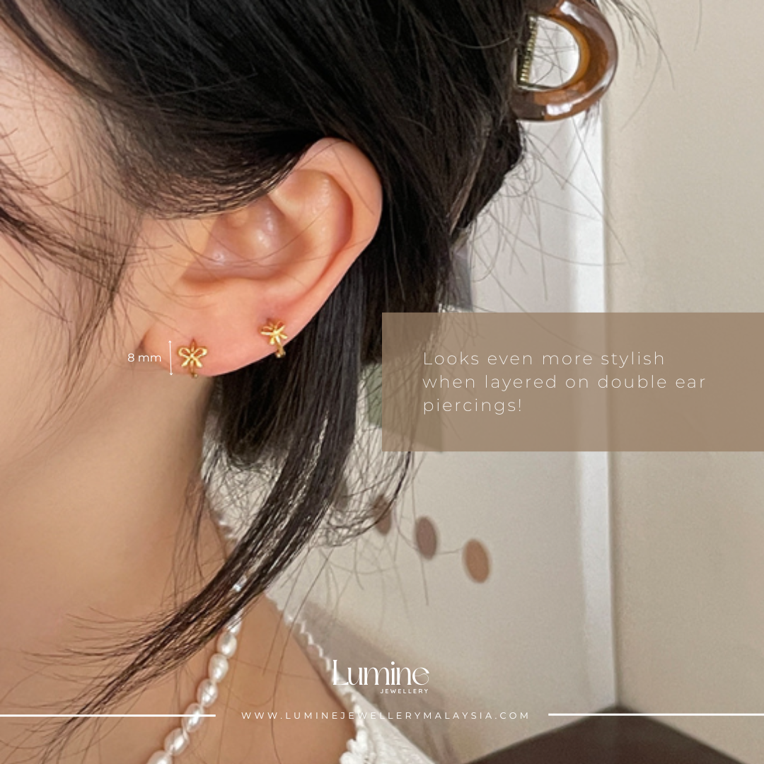 Delicate Silver Bow Hoops