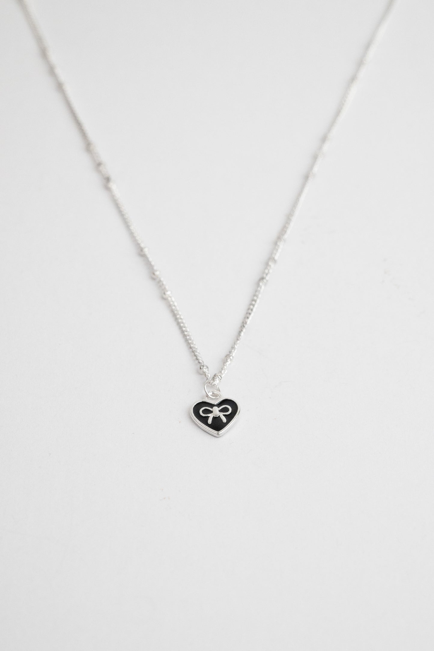 Tiny Bowknot in Heart Necklace