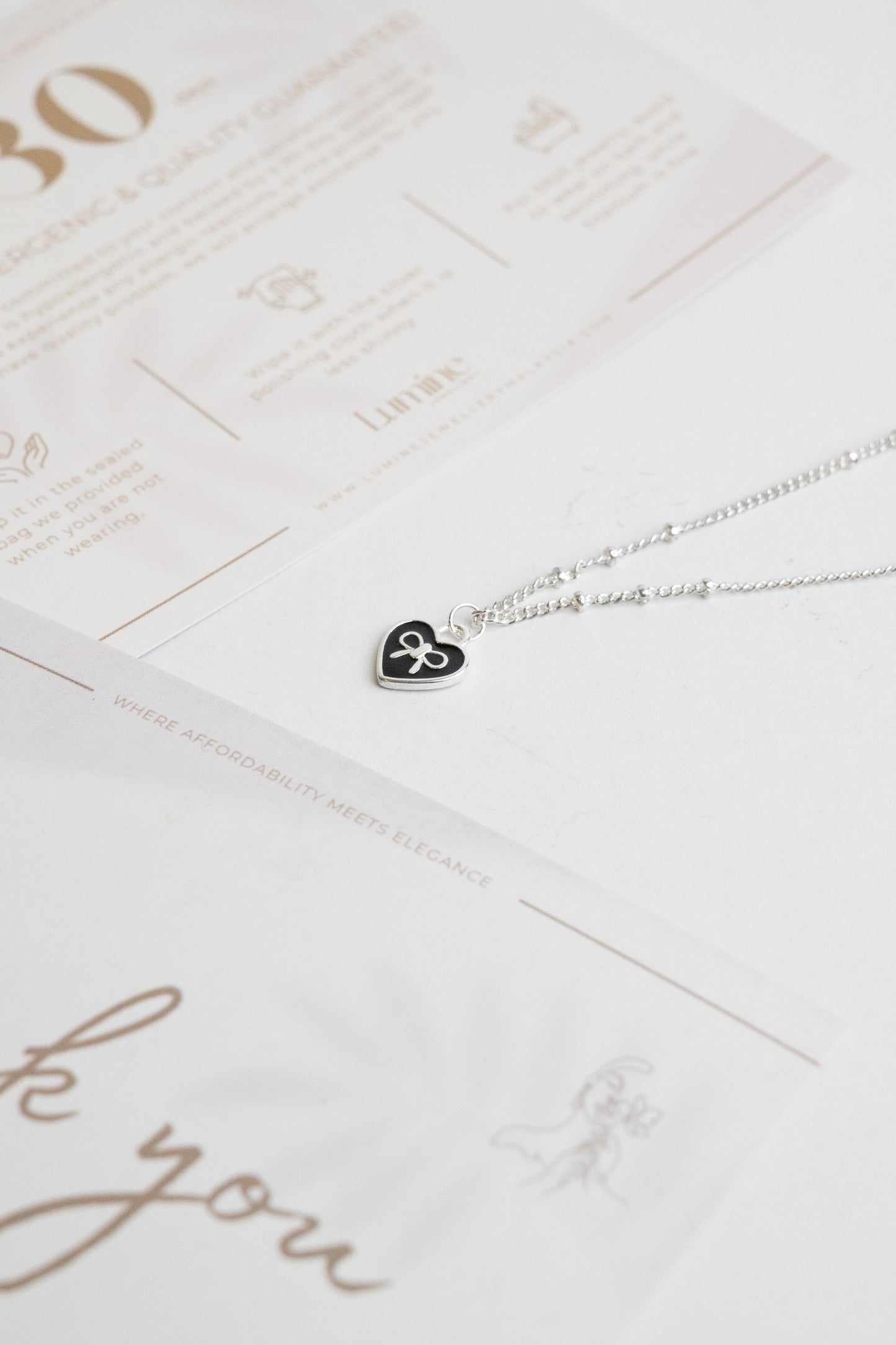 Tiny Bowknot in Heart Necklace