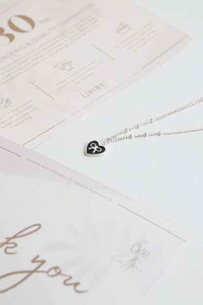 Tiny Bowknot in Heart Necklace