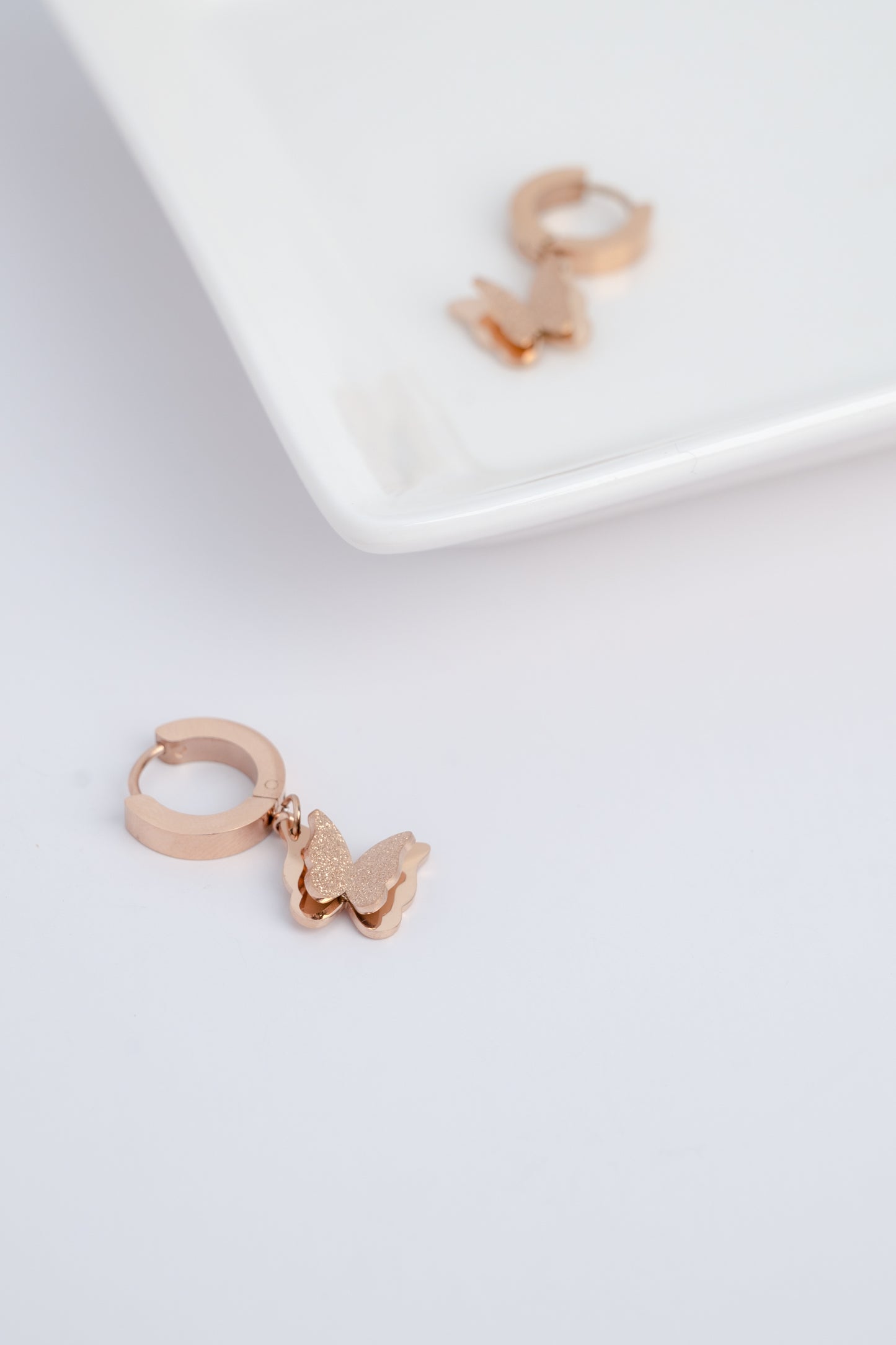 Rose Gold Flying Butterfly Earrings