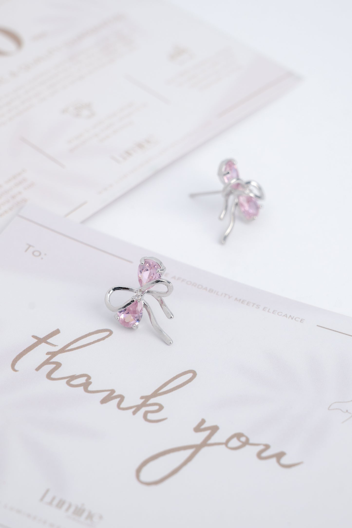 Glimmering Pink Bowknot Earrings