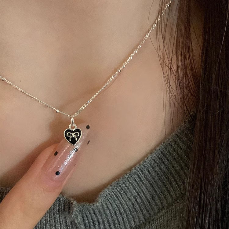 Tiny Bowknot in Heart Necklace