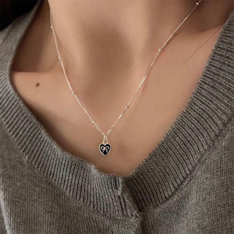 Tiny Bowknot in Heart Necklace